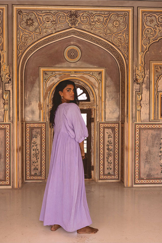 Daughters of India Kyra Maxi Dress in Lilac Gauze — back view in palace archway, gathered waist, cotton gauze